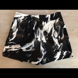 Skort with pockets in black gold brush pattern | AQUA by Bloomingdale’s